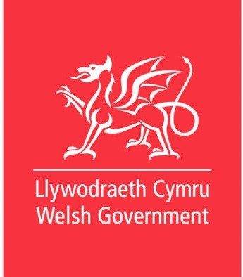 Logo of Welsh Red background featuring a red dragon and the text "Welsh Government" in Welsh.